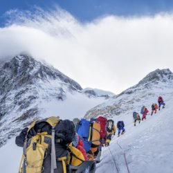Mountain climbing journey pass business climbers snowgrass south struggling grow wenatchee ridge way tourists source